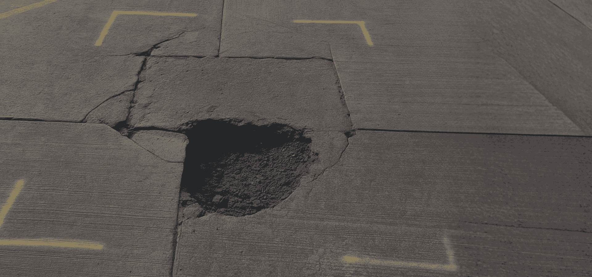 The hidden cost of potholes in service yards – what actually works? Banner